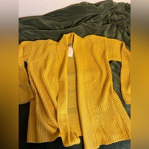- yellow sweater